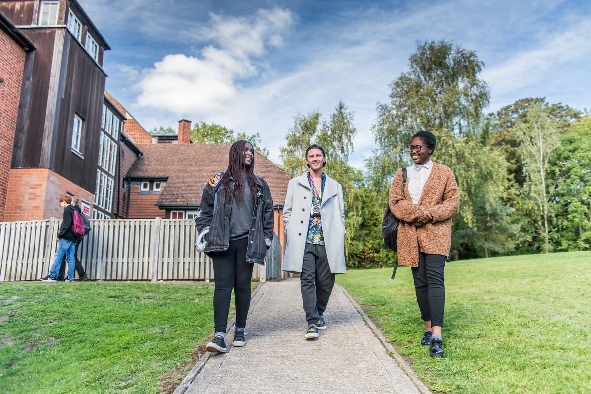 Students outside Farnham accommodation