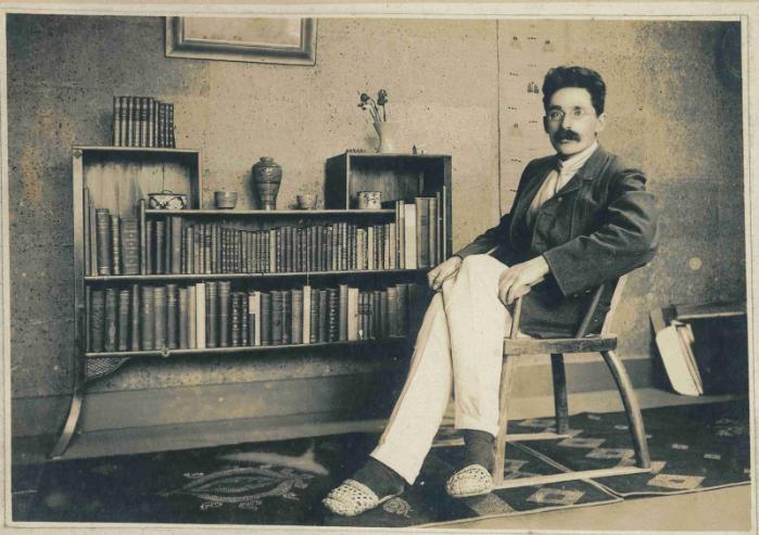 Bernard Leach sitting in a chair in his Tokyo home Bernard Leach sitting in a chair in his Tokyo home